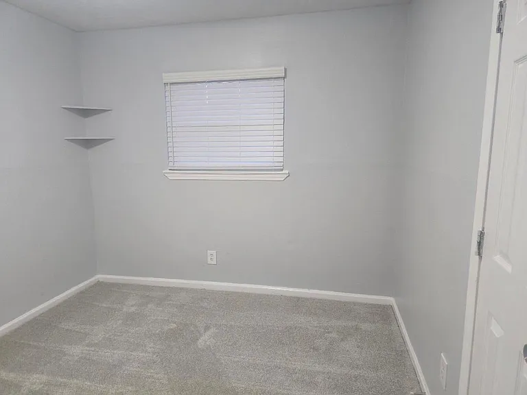 7702 Claiborne St — Photo 15