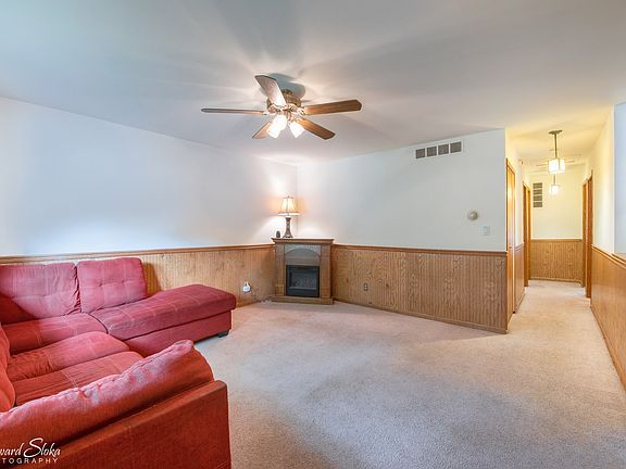 Hallway to 3 bedrooms and bath
