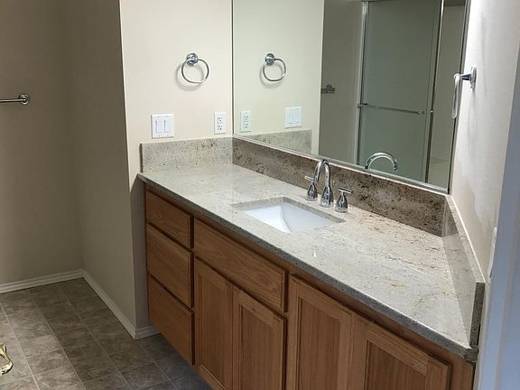 master bath with granite counters