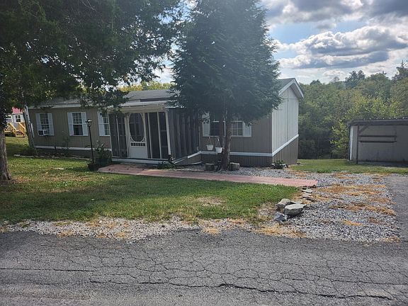 Two parking spaces and barn (to the right) for your use.