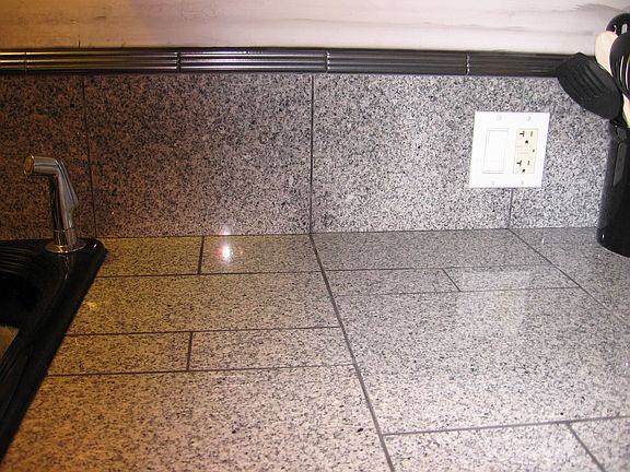 New granite tiles in kitchen