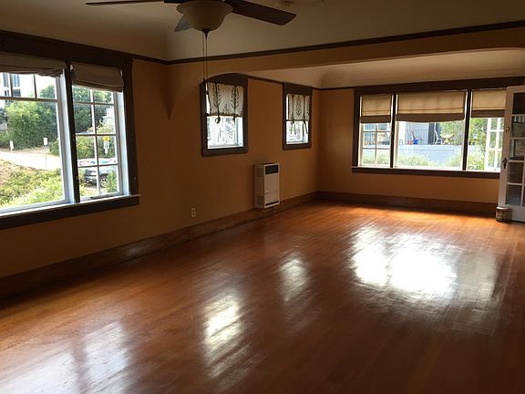 Living room with amazing light. Views to the south and west. Gas heater and ceiling fan.