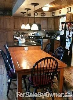 New kitchen : Remodeled kitchen with granite countertops and honey oak cabinents.