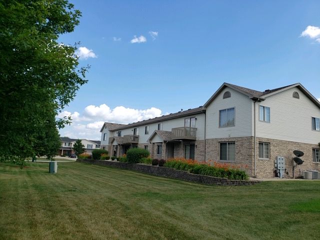 FRONT OF APARTMENT BUILDING