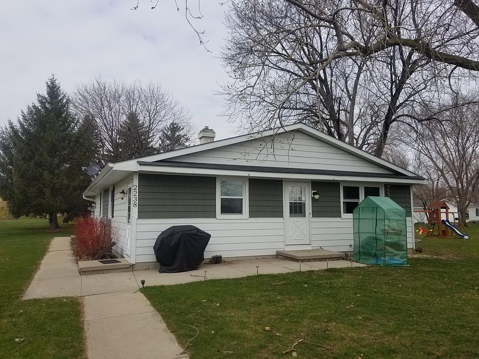front of the duplex all new shakes and windows