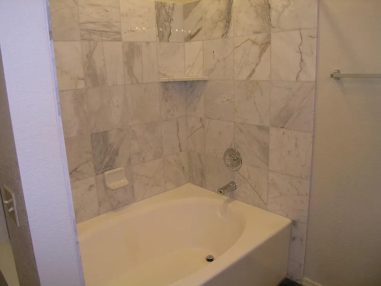 Roman Tub with Marble Surround