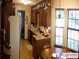 Large well laid kitchen with bay window