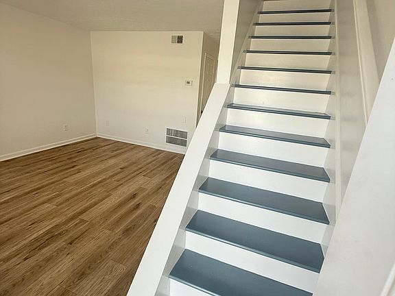 living room and stairs to go to the second floor
