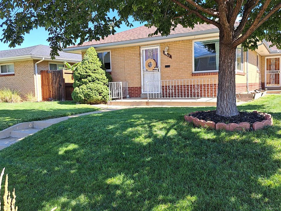 Front duplex home is set forward of the other unit with only one adjoining wall.