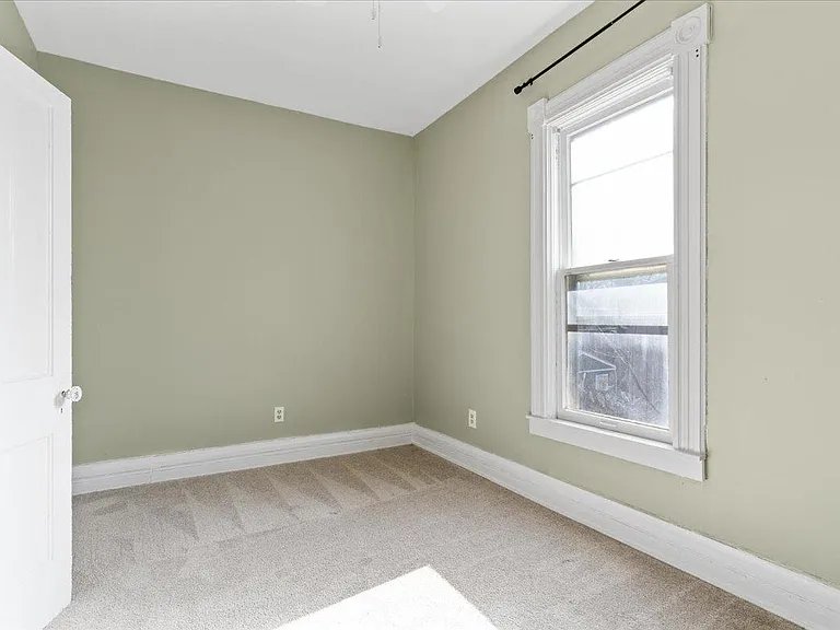 Second bedroom also has fresh paint, newer carpet and light fixture.