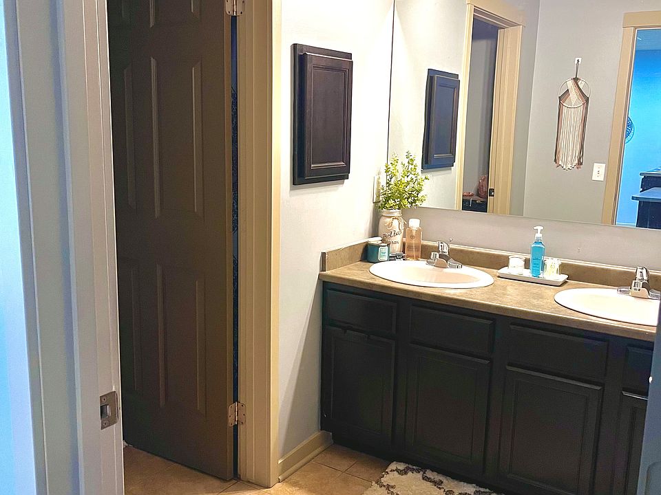 Large bathrooms with full size tubs.