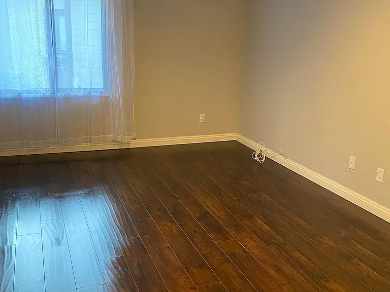 Large Quiet Bedroom with Double Pane Window.