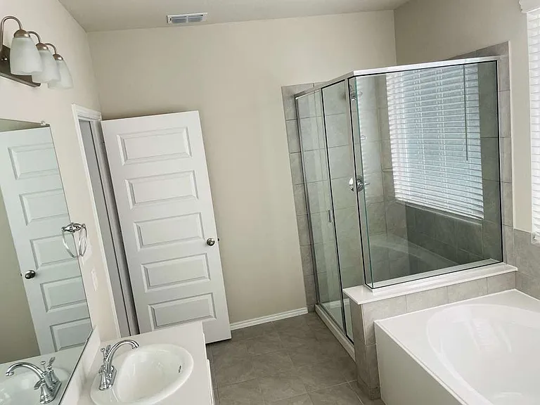 Master bedroom Bath room suit with Double Vanity and double bath ( standing and Tub included with Large view walk in