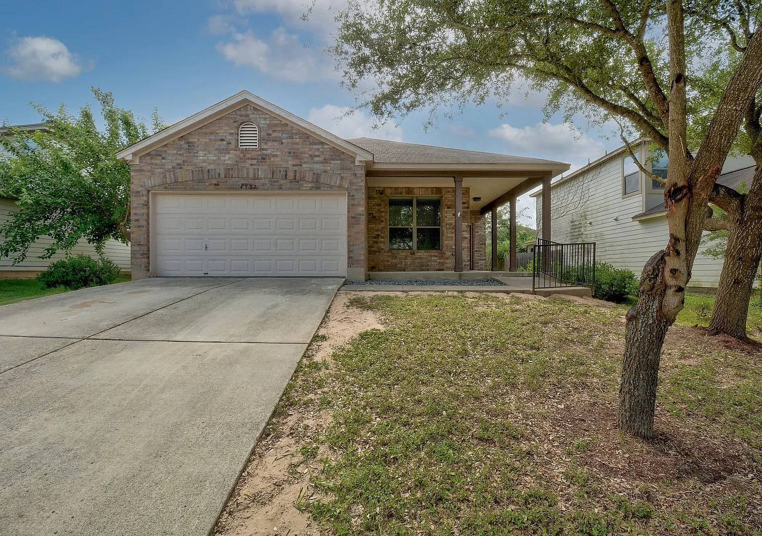 4507 Peach Grove 78744 | 4 Bedroom 2 Bath 2 Car Garage $2395 — Photo 1