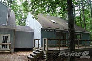 back of home with sundeck