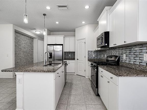 4th image of 4848 DEEP CREEK TERRACE