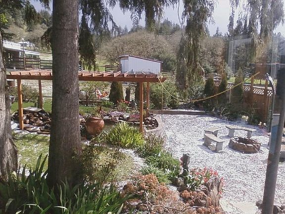 koi pond and firepit