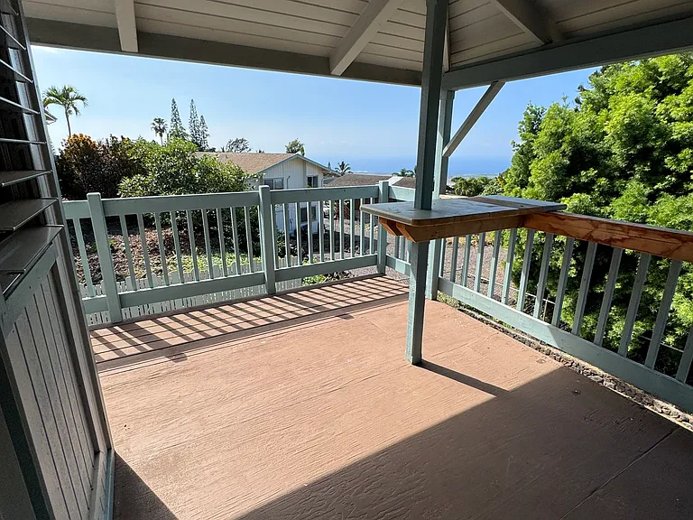 Photo of balcony with a partial ocean view