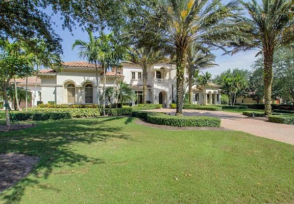 Home For Sale In Old Palm Golf Club