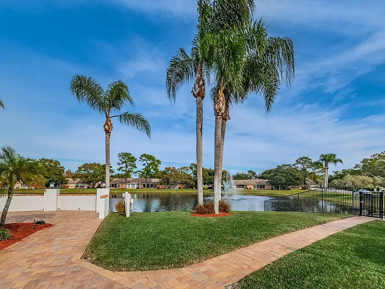 57-web-or-mls-25-Walkway and Pond View_07112026