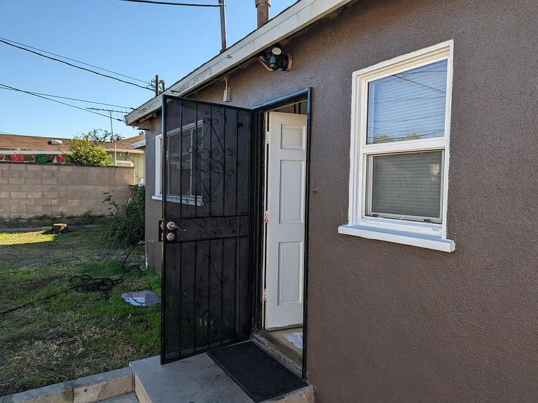 Iron doors installed at front and back of the house