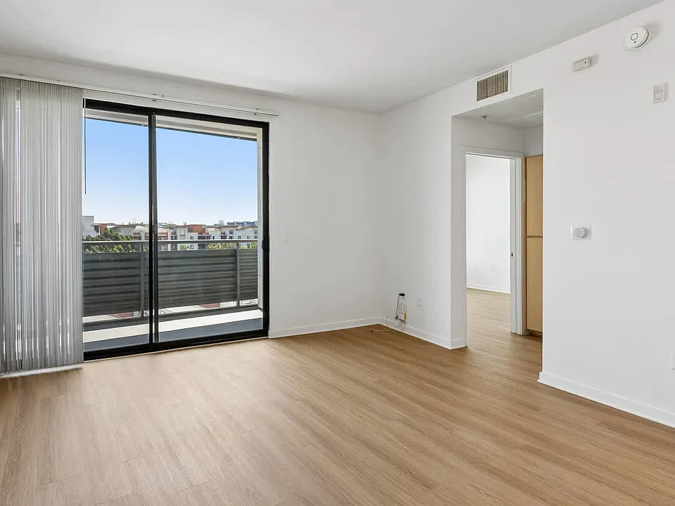 Living Room with Balcony and Hard Surface Flooring