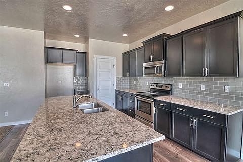 Grey with Granite Countertops..pantry