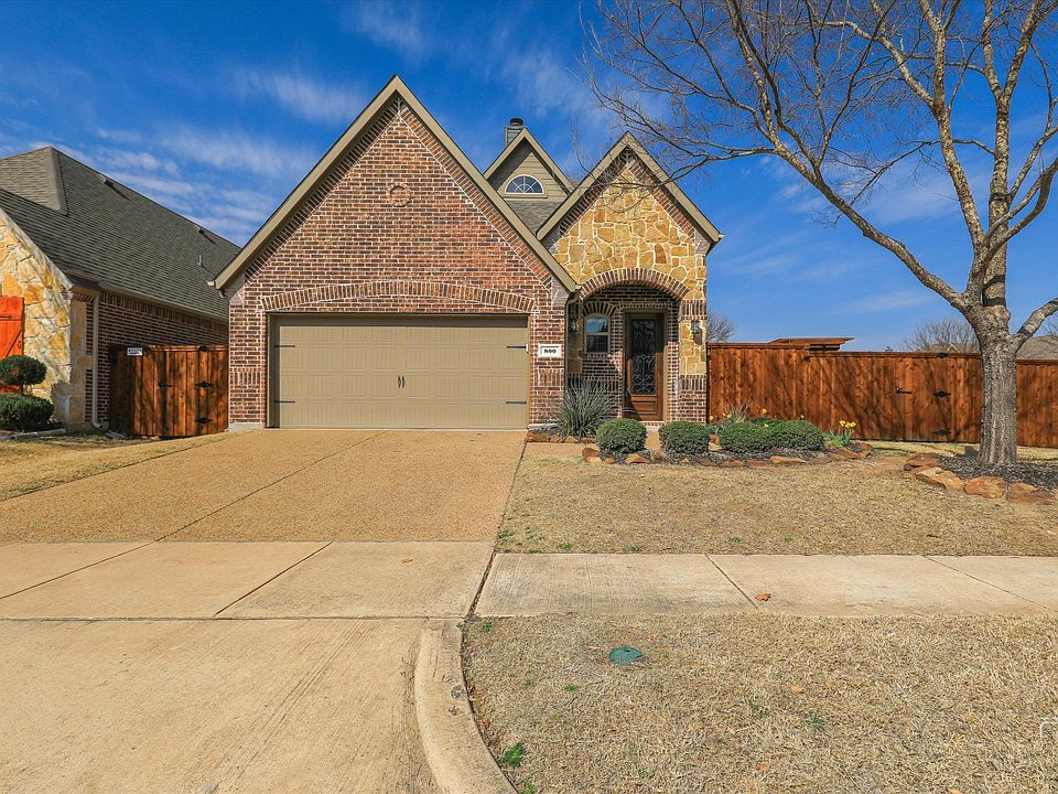 Front with 2 car garage