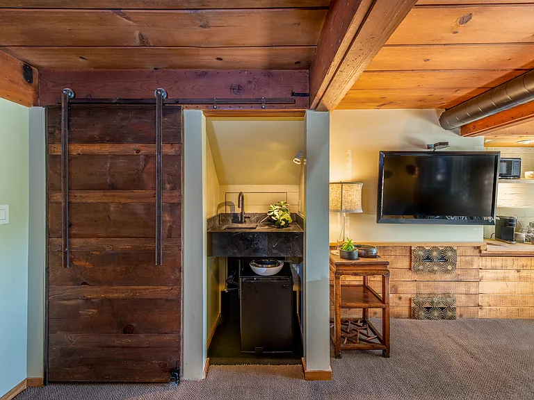 Small kitchenette and tv area in the den