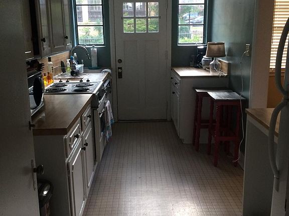 galley kitchen with entry door