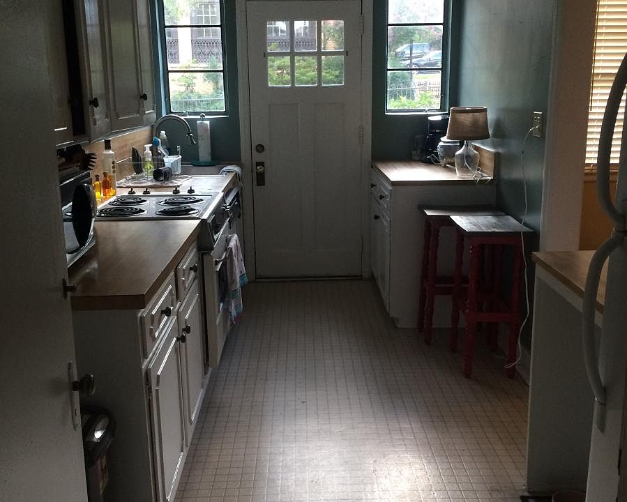 galley kitchen with entry door