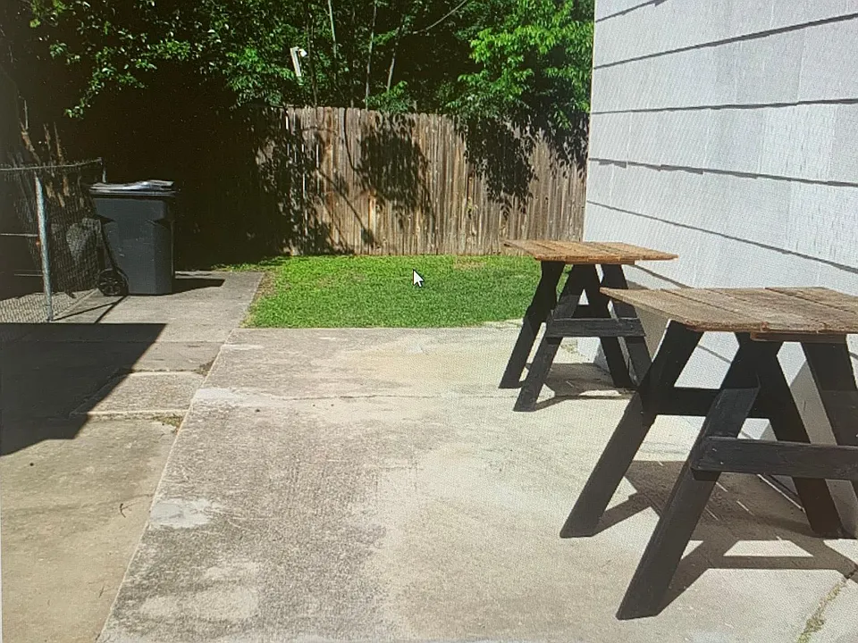 Walkway to private back yard and back steps.