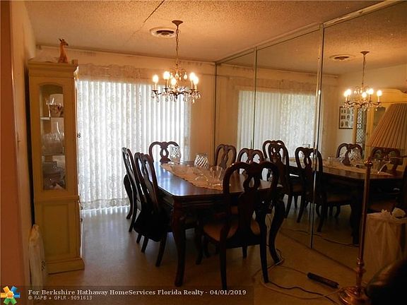 FORMAL MIRRORED DINING ROOM