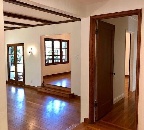 Foyer looking into living room, dining room, and hallway
