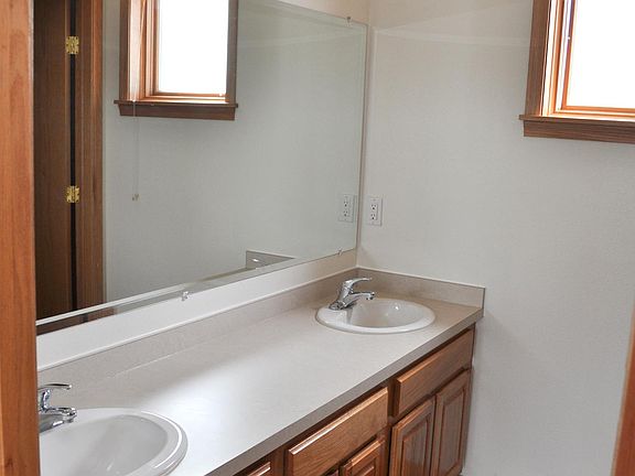 Master bathroom with dual sinks 