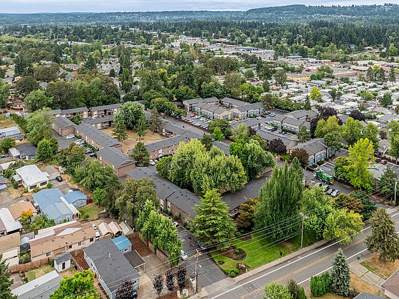 Discover Fox Pointe Apartments from above, surrounded by Portland's natural beauty and urban convenience.