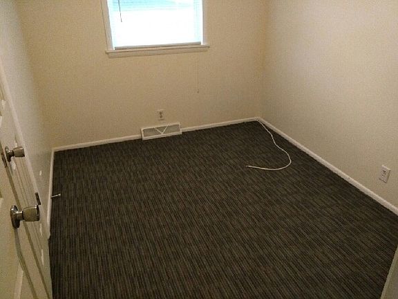 One of three bedrooms