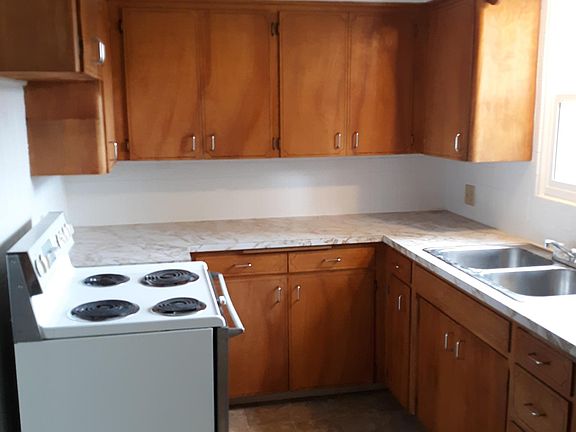 Solid wood Maple Cabinets in kitchen with new dishwasher