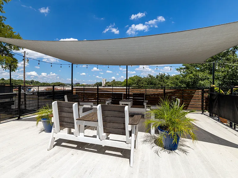 Enjoy this outdoor terrace with plenty of seating.