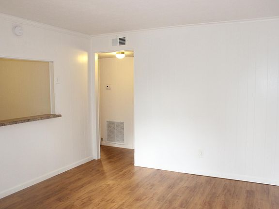 Living room with pass-through to kitchen/dining area