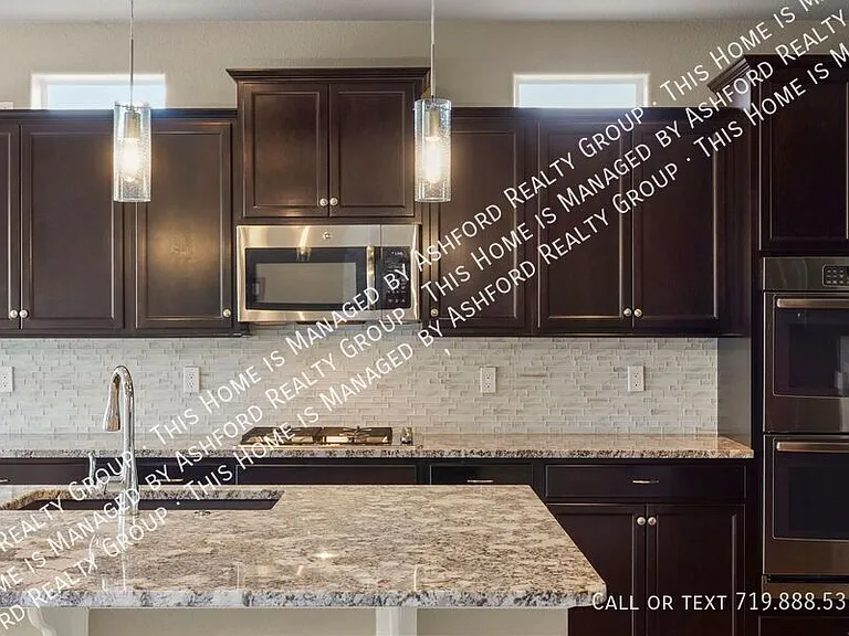 7215 Rim Bluff Ln — Photo 12