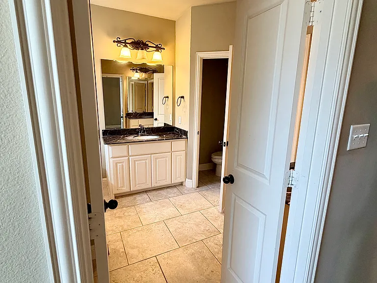 Primary bedroom connected bathroom