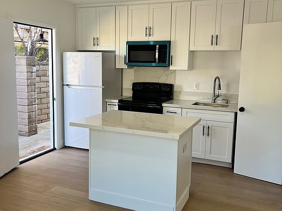 Island kitchen with all new appliances