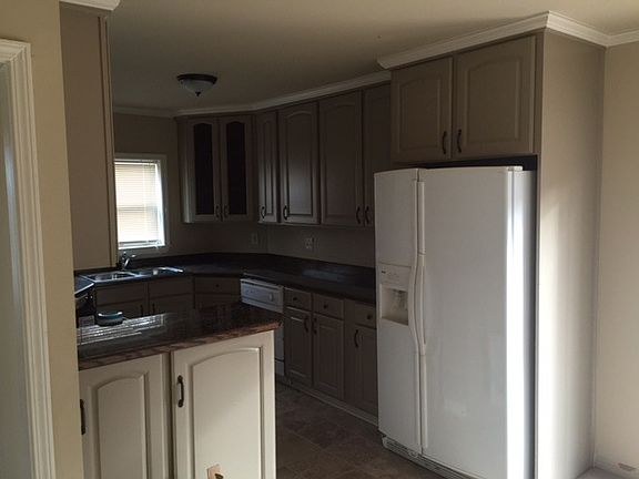 Large kitchen with breakfast bar