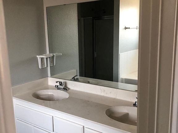 master bathroom with dual vanity