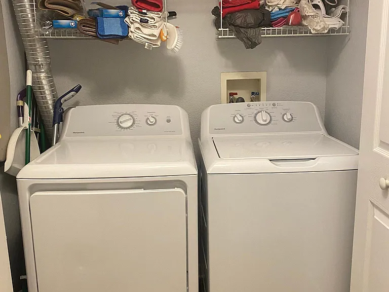 Full size Washer & Dryer. Ample storage space. Sorry, did not have time to organise and look a bit more elegant to the eye.