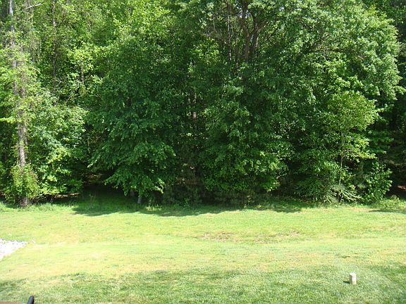 Deck and Patio overlook Wooded Area of the Neuse River Greenway