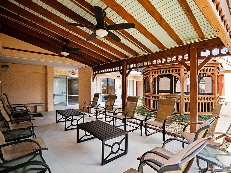 Covered seating area - near pool and elevator