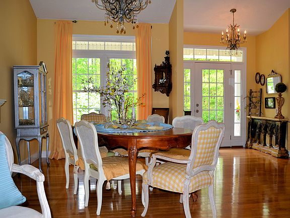 Elegant Foyer &amp; Dining Area Greet You As You Step In The Front Door