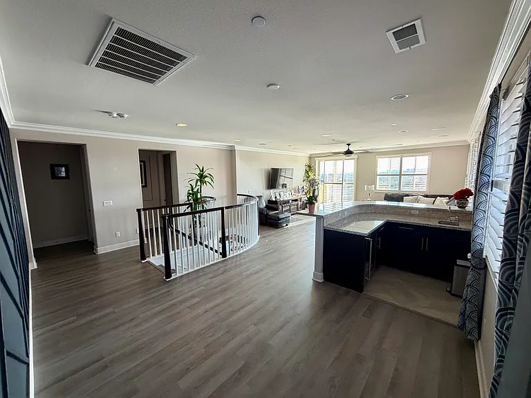Upstairs loft with built-in wet bar and kitchen aid wine fridge